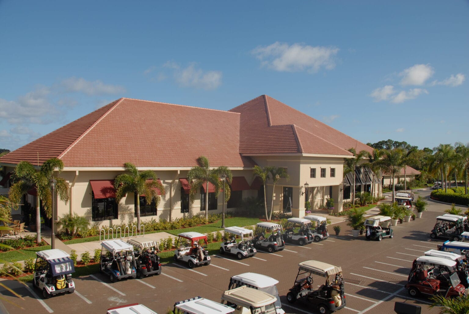Frenchman’s Creek Country Club in Palm Beach featuring renovated clubhouse design, golf cart access, and luxury country club amenities by ODSI.