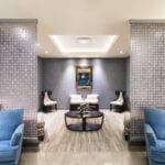 Elegant waiting area at Renew You Plastic Surgery & Spa in Texas featuring modern interior design, comfortable seating, and calming wellness space by ODSI.