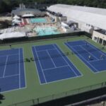 Commercial fitness center design of outdoor tennis courts and pool at the Weymouth Club in Massachusetts.